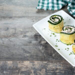 Looking for a delicious and healthy recipe? Look no further than these grilled zucchini rolls with cottage cheese, pesto, and dill.